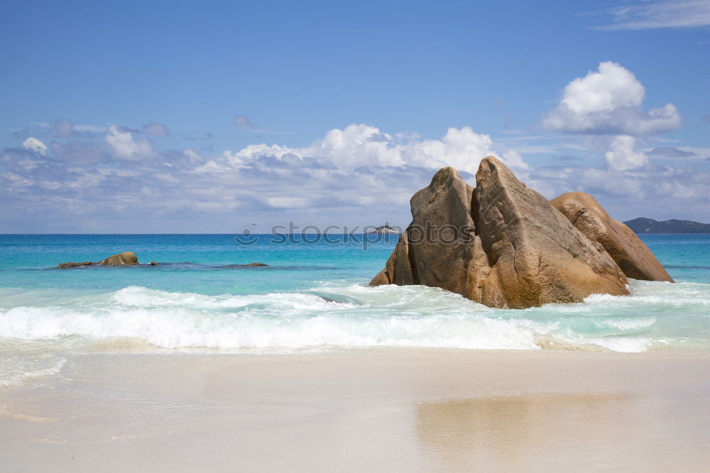 Similar – A view of a isolated beach and blue waters