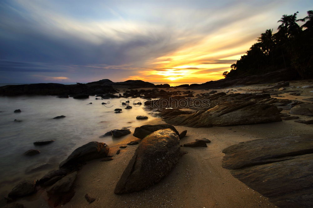 Similar – Image, Stock Photo Liapades Beach, evening atmosphere on a stony beach, waves breaking on a rock behind which the sun is setting