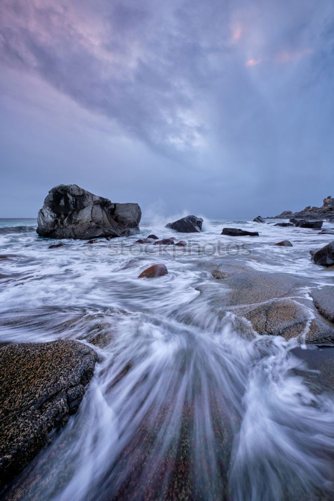 Similar – Image, Stock Photo Sea waving near rough rocks during sunset