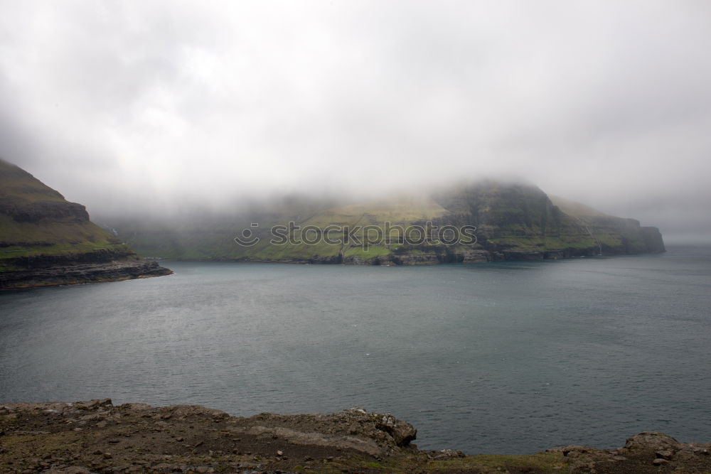 Similar – Image, Stock Photo Rocky coast with pathway running on top