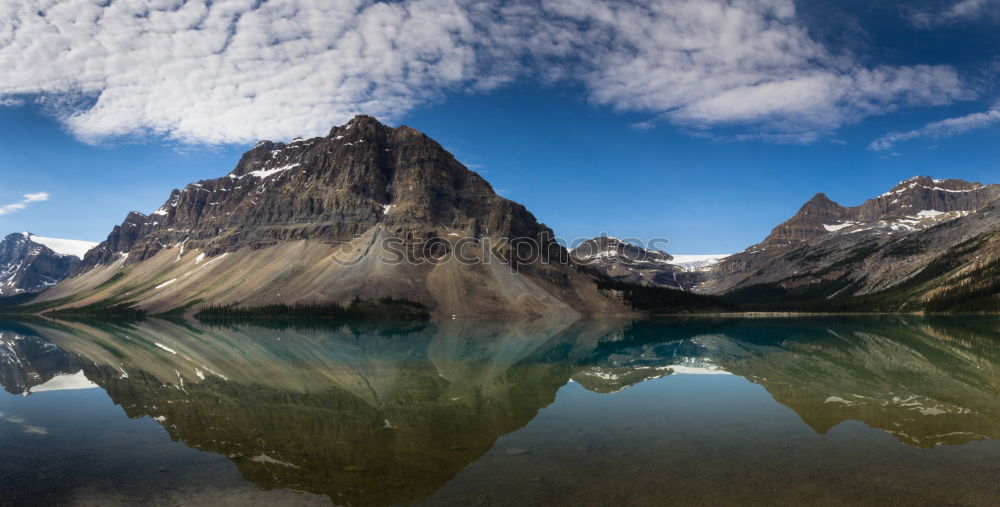 Similar – Image, Stock Photo Lake in snowy rocky mountains