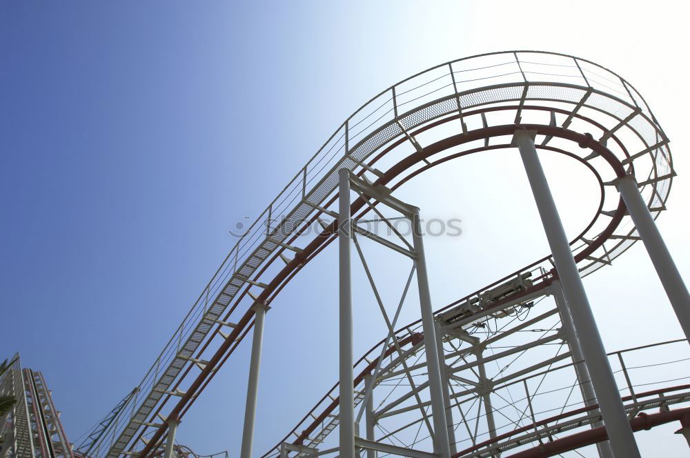 Similar – Loop. Roller coaster