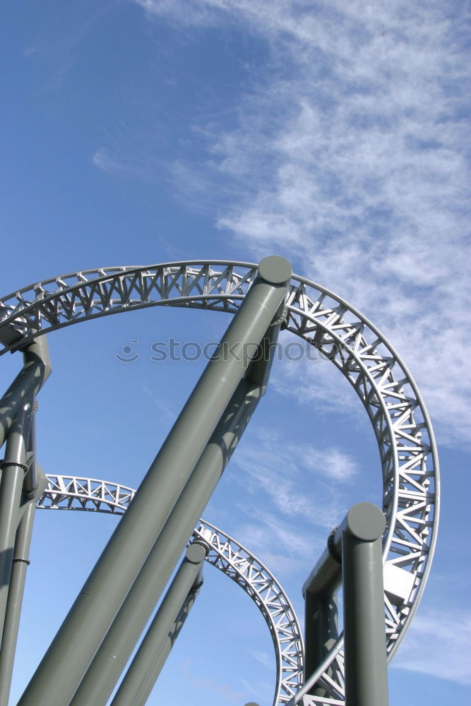 Similar – Loop. Roller coaster