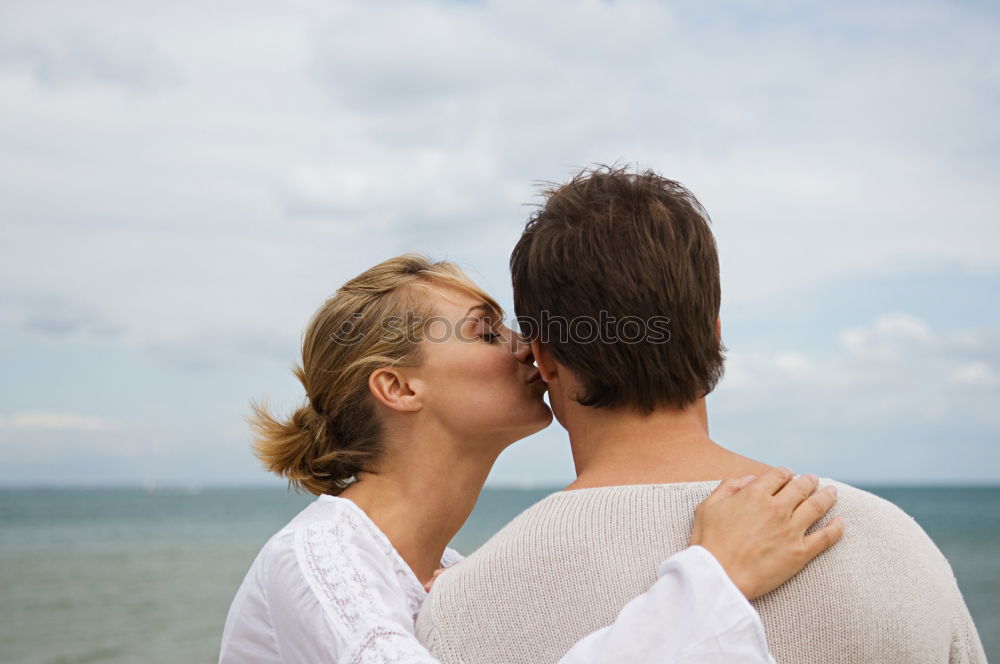 Similar – Happy father and son playing on the beach