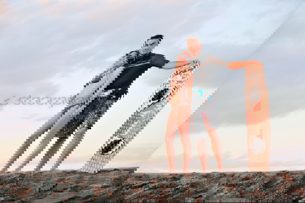 Similar – Image, Stock Photo Young adult couple doing fitness workout on beach