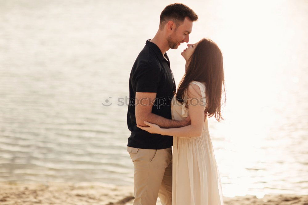 Similar – Image, Stock Photo Tender kissing bridal couple in sunlight