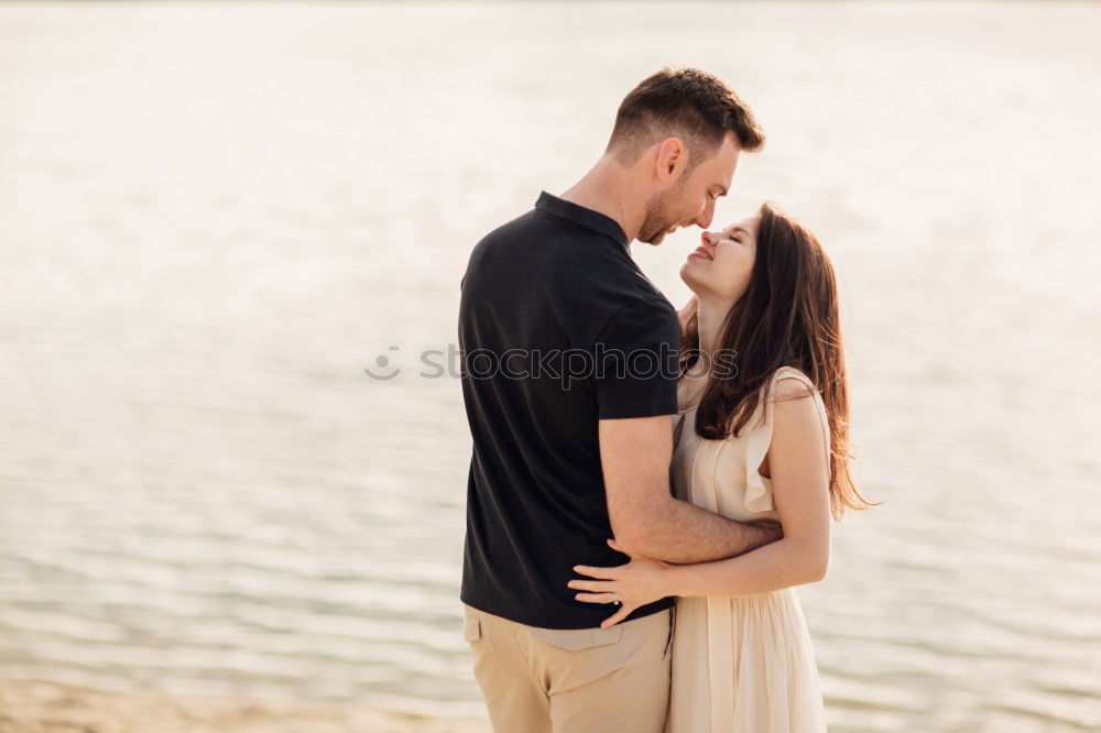 Similar – happy young couple kissing on the walk