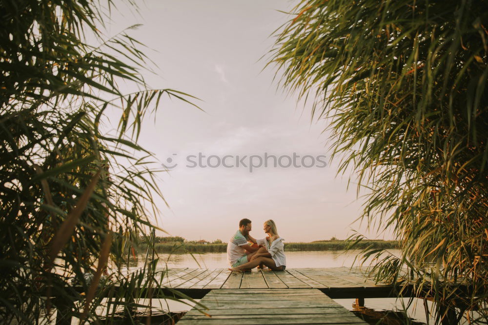 Similar – Romantic couple riding bicycles