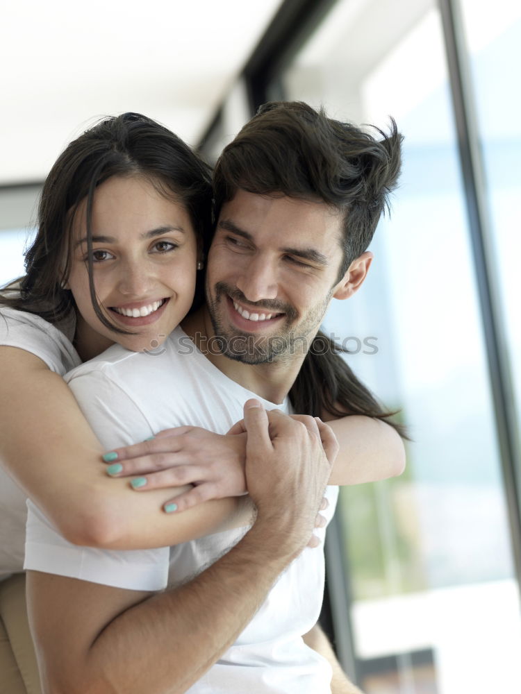 Similar – Smiling couple of lovers having fun.