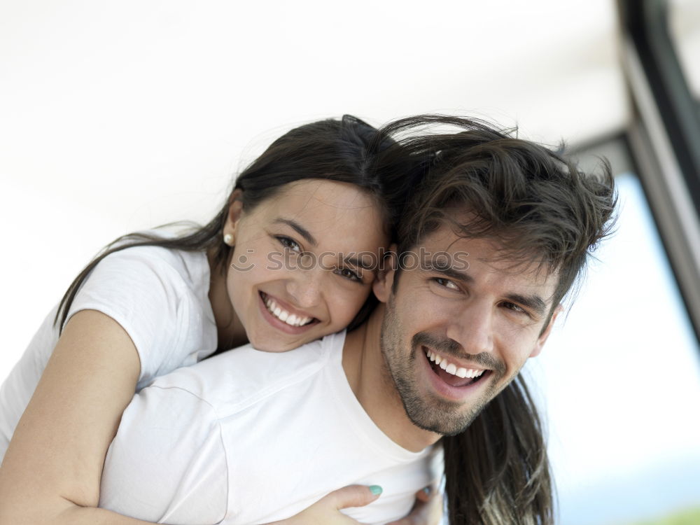 Similar – Smiling couple of lovers having fun.