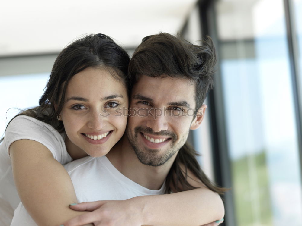 Similar – Smiling couple of lovers having fun.