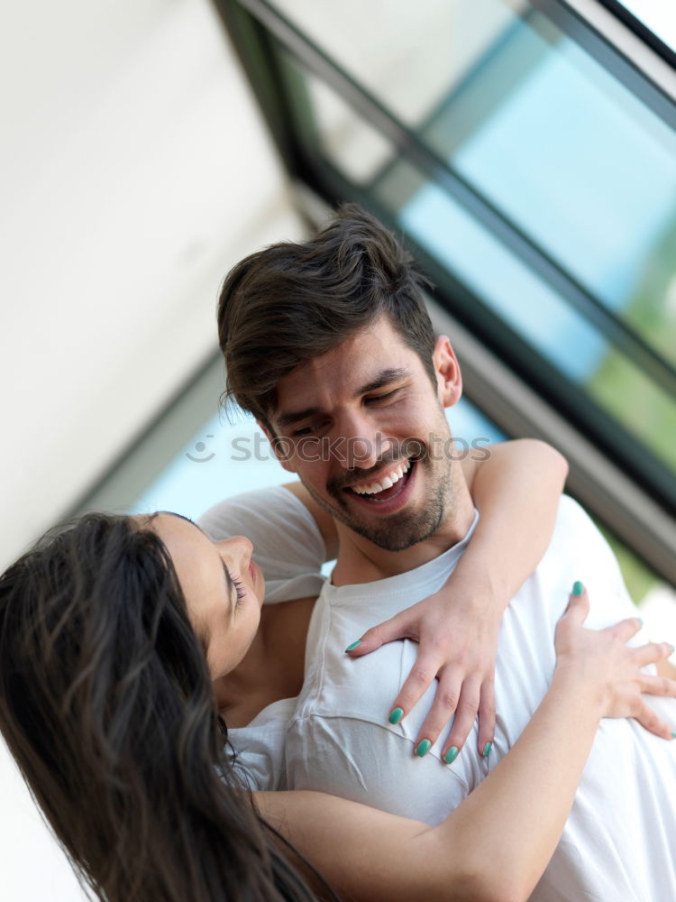 Similar – Image, Stock Photo Romantic young couple looking at window