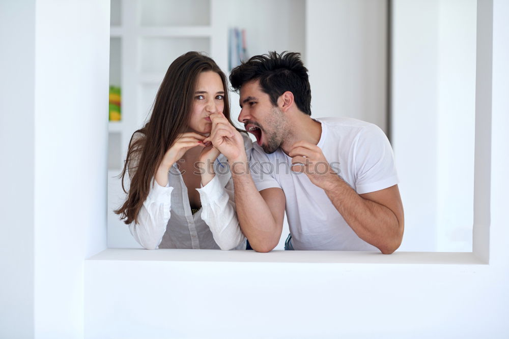 Similar – Image, Stock Photo Mixed Race couple taking funny selfie with phone together