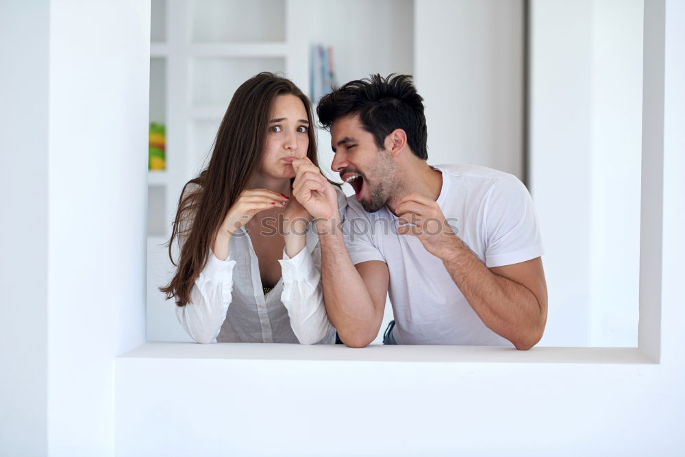 Image, Stock Photo Mixed Race couple taking funny selfie with phone together