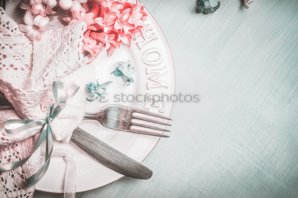 Similar – Image, Stock Photo Spring Table Decoration with Plate, Cutlery and Hyacinths