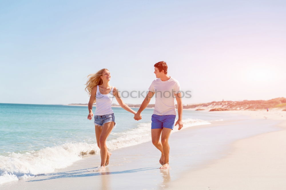 Similar – Image, Stock Photo Romantic bride and groom strolling on beach