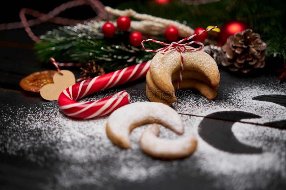 Similar – Image, Stock Photo Santa hat and decoration on a dark wooden table