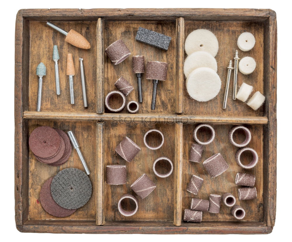 Similar – Cracking nuts with different tools, arranged next to crushed walnuts