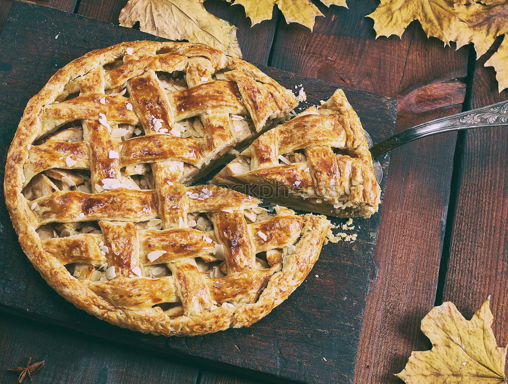 Similar – Image, Stock Photo baked round apple pie and one cut piece on a plate