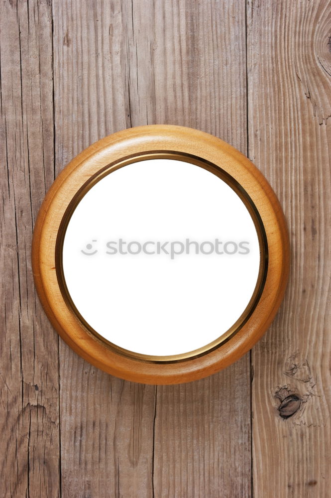 Similar – Image, Stock Photo Ornate oval metal picture frame without picture on a rusty nail on the outside of a brown wooden hut in the harbor garden in Offenbach am Main in Hesse, Germany