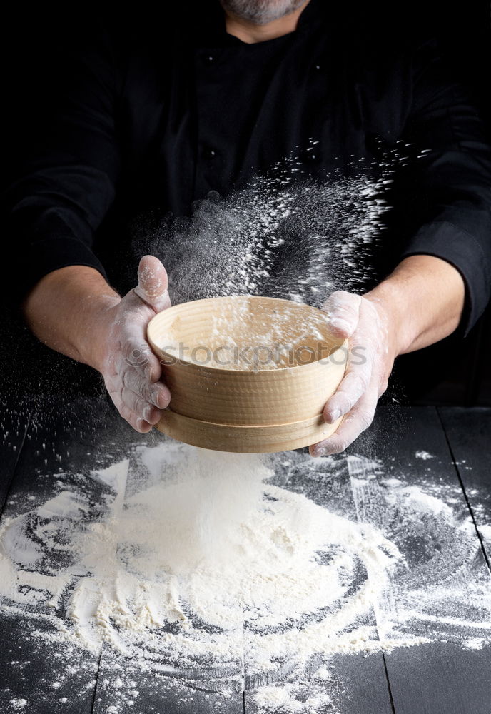 Similar – Image, Stock Photo spoon with white wheat flour in the male hands of a cook