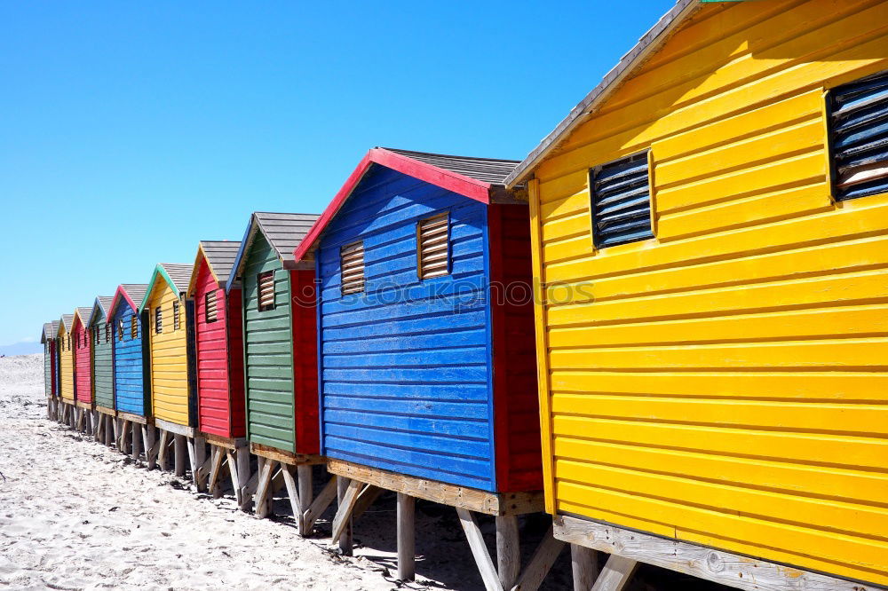 Similar – Colorful houses on piles