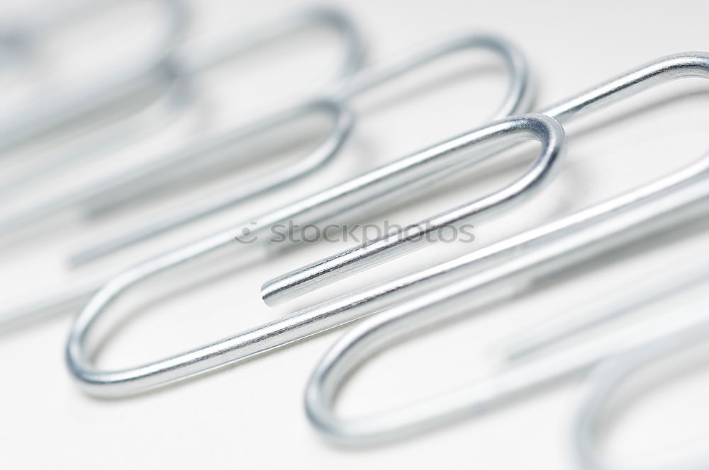 Similar – Image, Stock Photo several paperclips magnetically adhere to a container