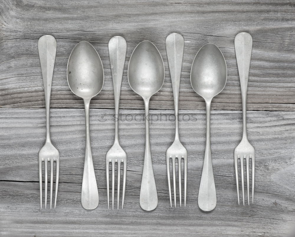 Similar – Wooden background with vintage spoons and forks