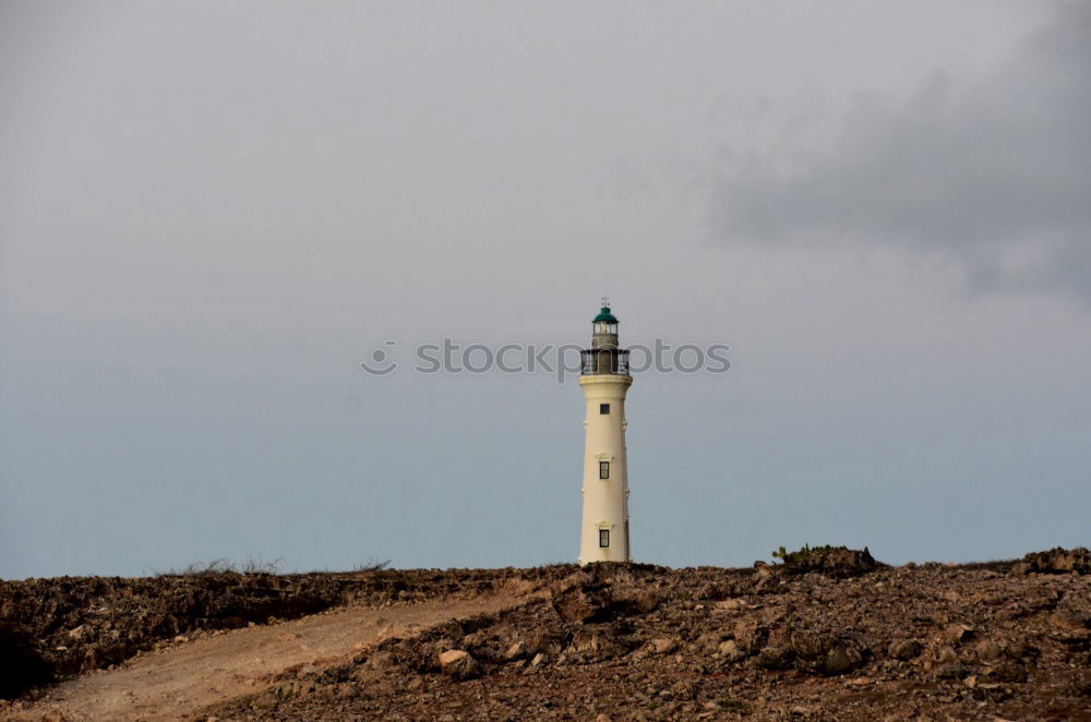 Similar – Foto Bild Leuchtturm vor Meer bei bewölktem himmel.