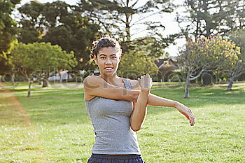 Similar – Image, Stock Photo Shirtless black man doing stretching in urban park.