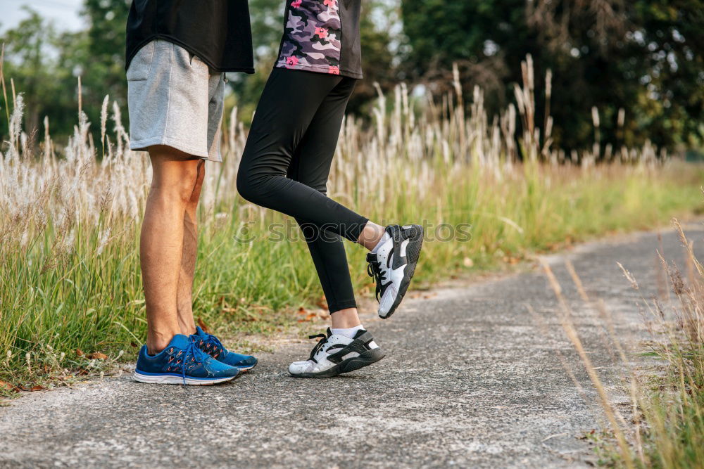 Similar – Image, Stock Photo Young athlete couple doing stretching exercise together