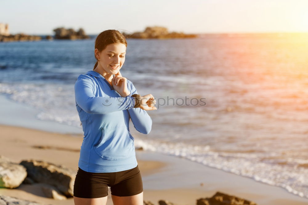 Similar – Man running at sunset on a sandy beach in a sunny day