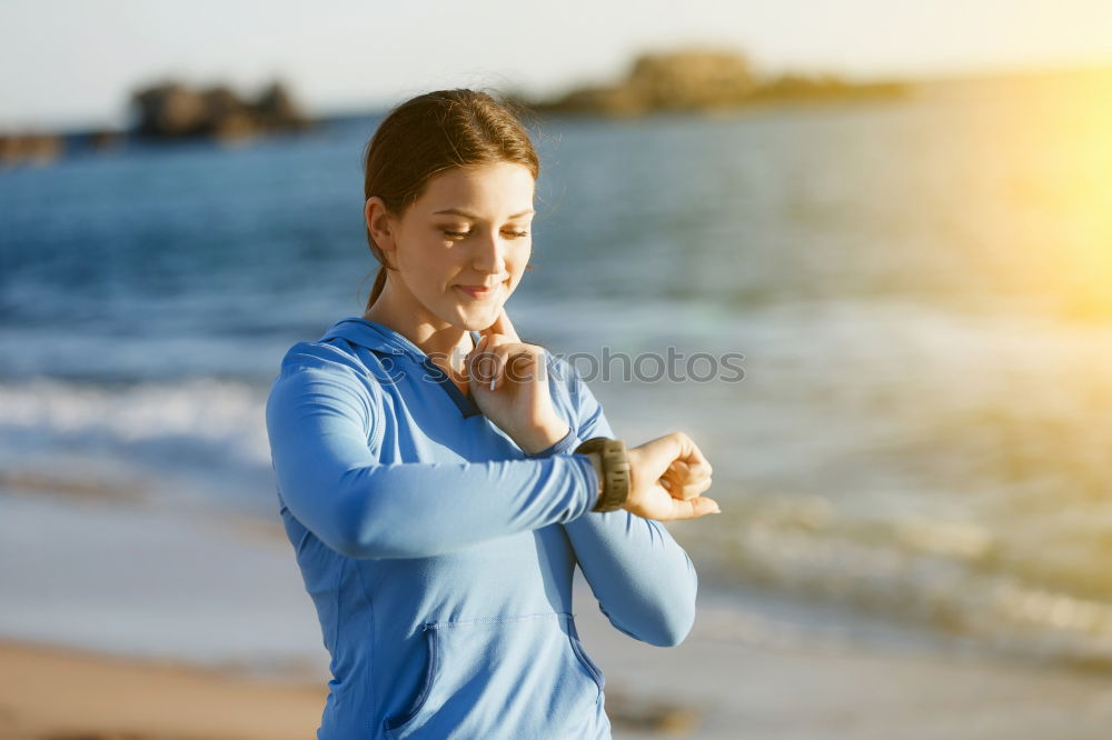 Similar – Black woman using smartwatch touching touchscreen