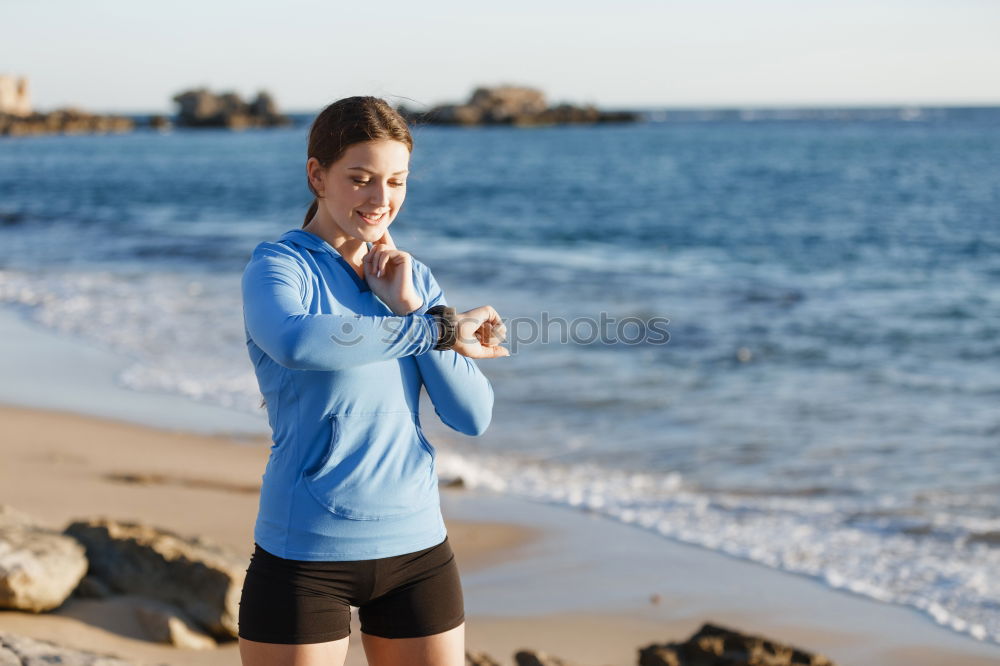 Similar – Man running at sunset on a sandy beach in a sunny day