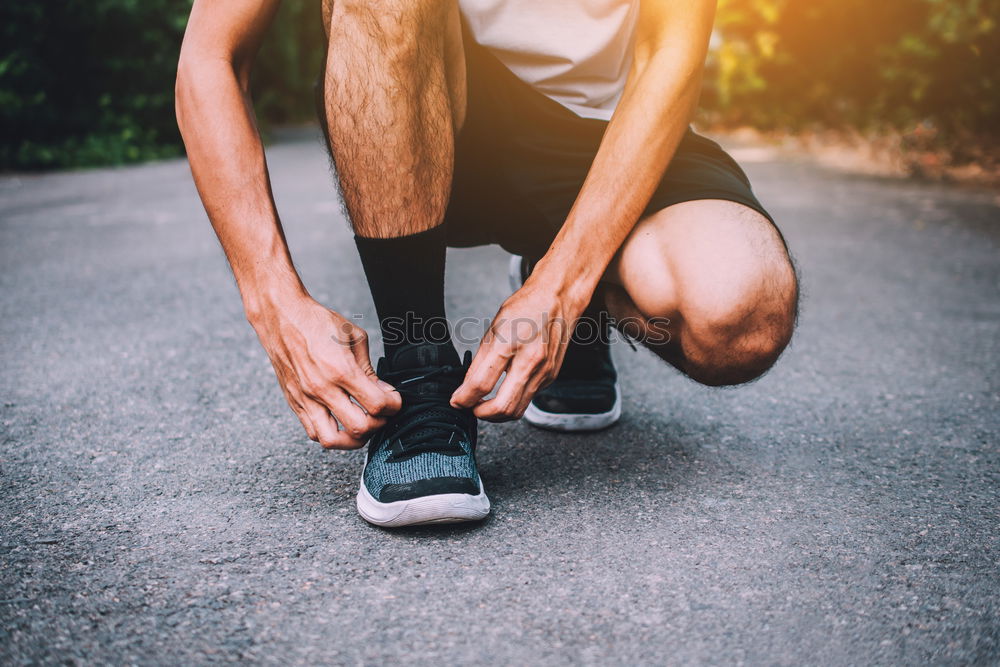 Similar – Image, Stock Photo Close up of legs of runner in the city.