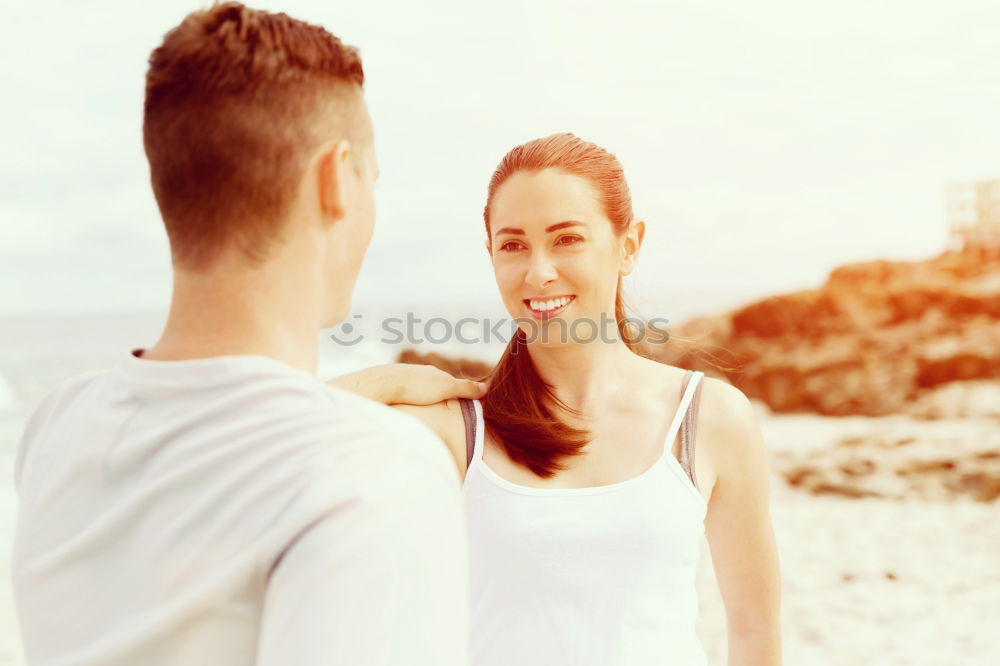 Similar – Image, Stock Photo Smiling young woman and man sitting on a pier over the sea