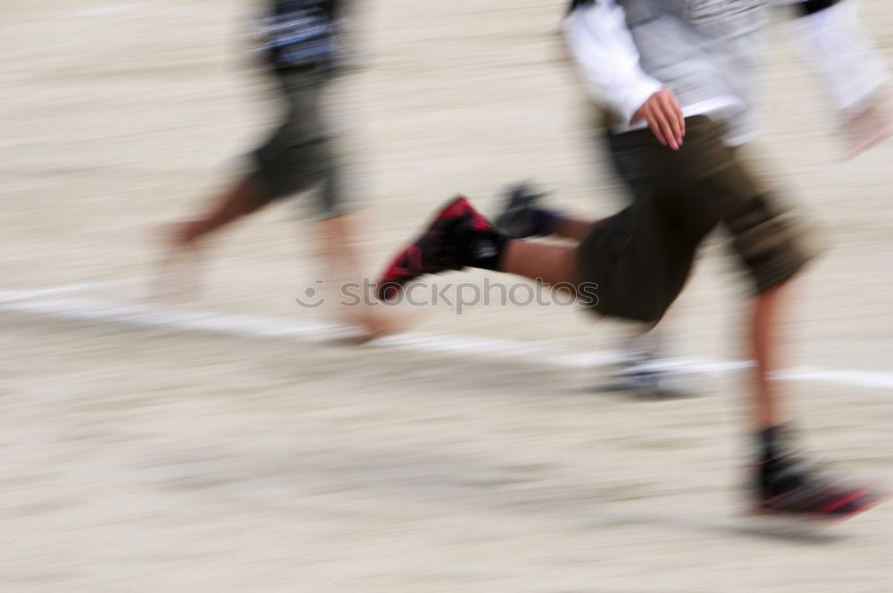 Similar – Crop man riding skateboard in desert