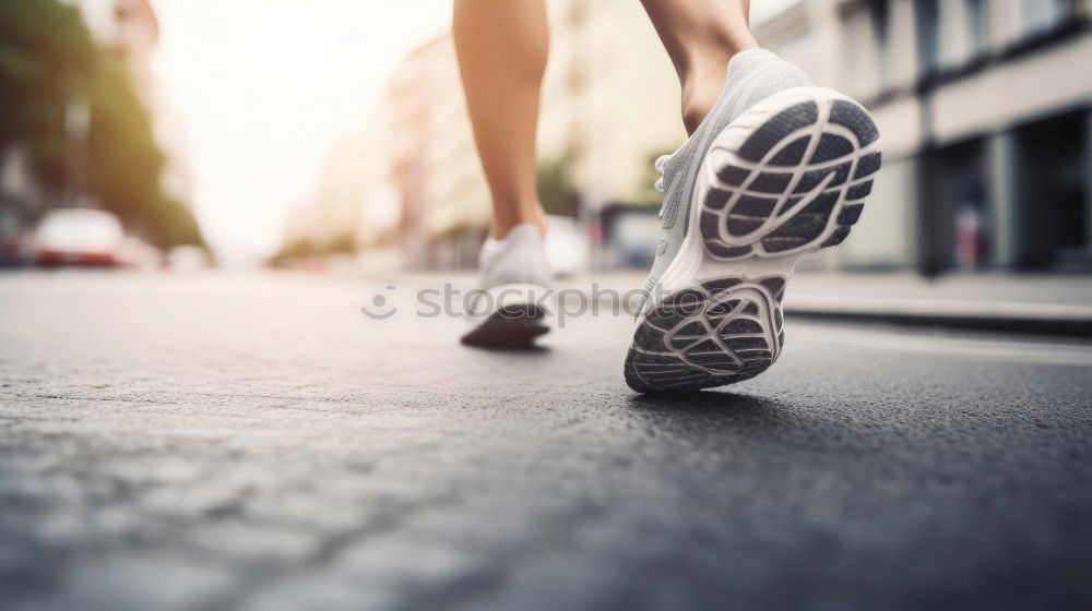 Similar – Image, Stock Photo Close up of legs of runner in the city.