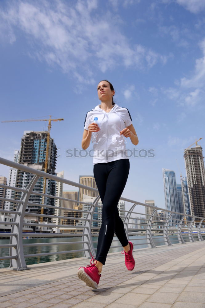 Image, Stock Photo Young couple running on a seafront promenade