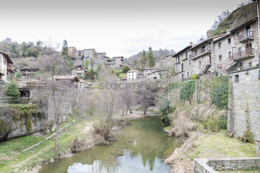 Similar – Image, Stock Photo stone bridge of an ancient village under cloudy sky