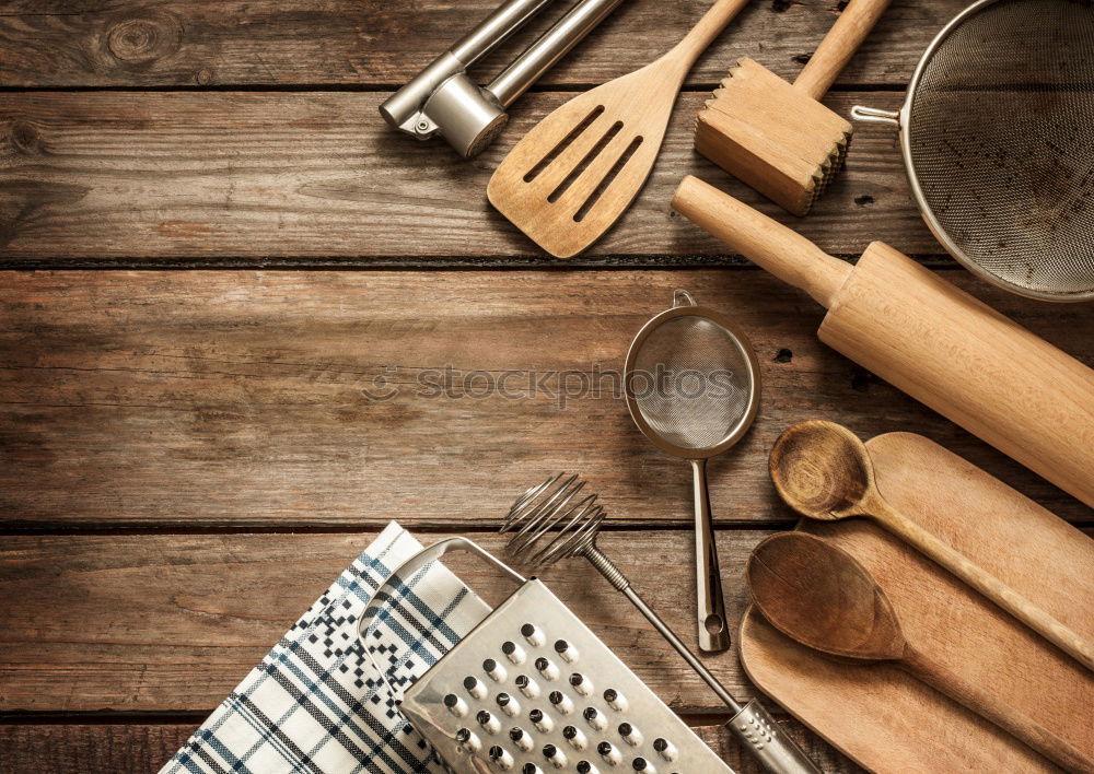 Similar – Empty grill pan with wooden spatula and spoon