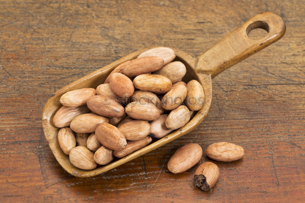 Similar – Soy beans on wooden spoon and wooden table