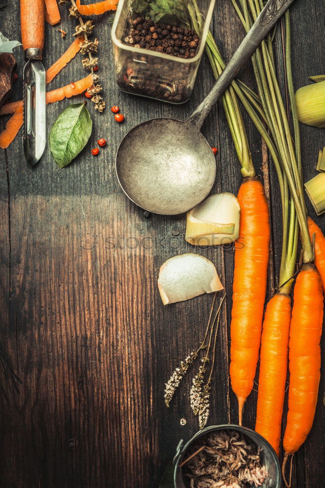 fresh vegetables and a glass of carrot juice