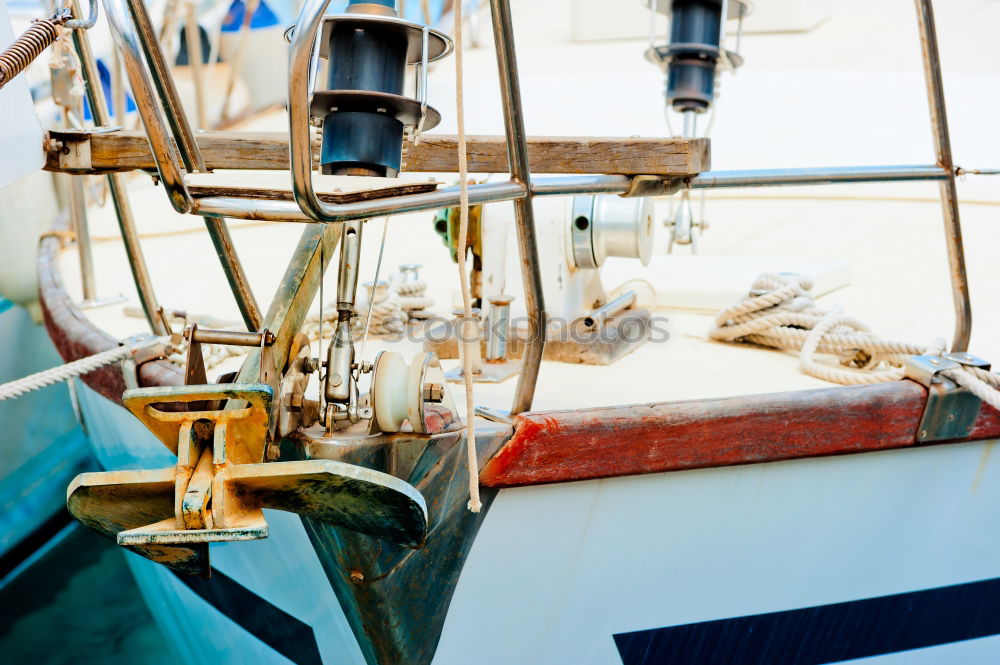 Similar – Fenders suspended between a boat and dockside for protection. Maritime fenders