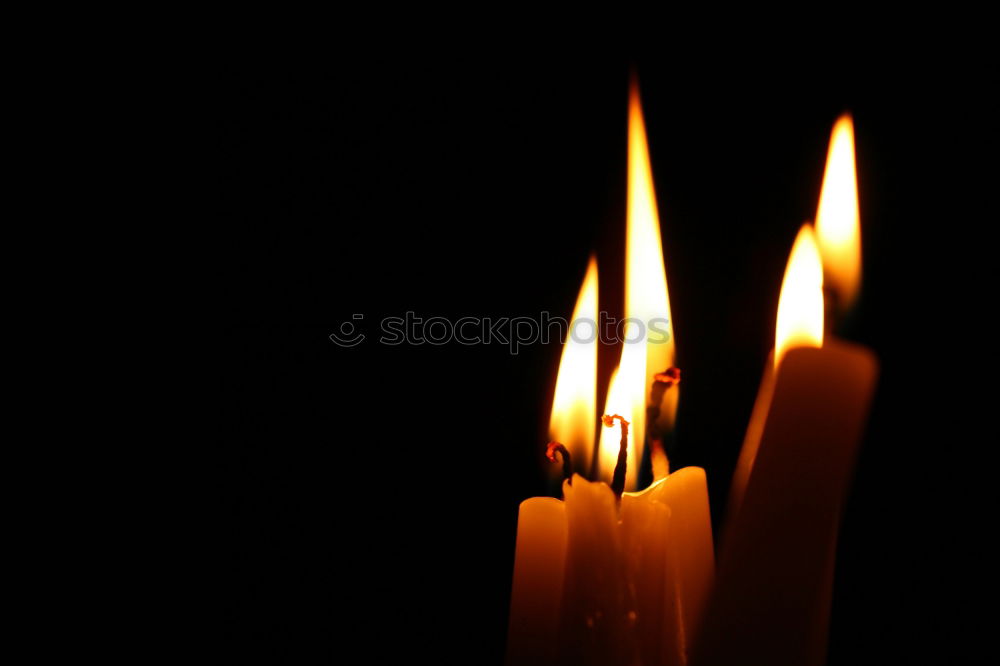 Similar – light a candle for Candle