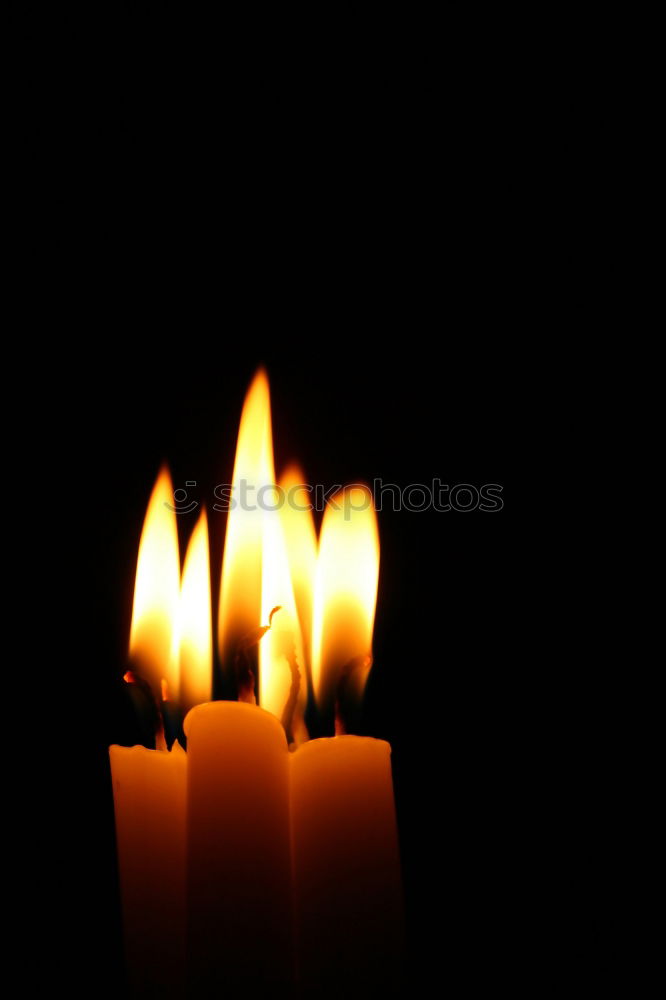 Similar – light a candle for Candle