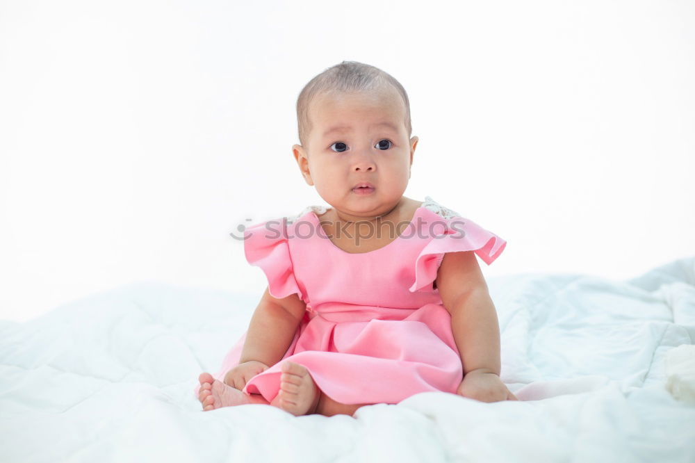 Similar – Cute Baby Girl Lying in the Crib