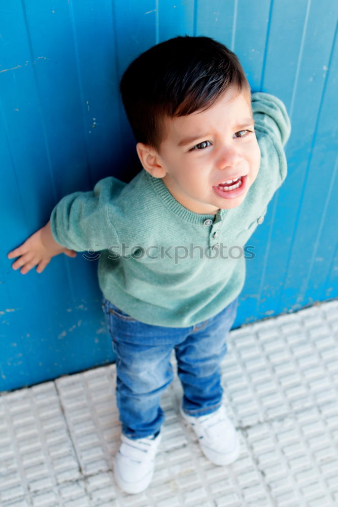 Similar – Portrait of a cute little boy on a village of an island greek