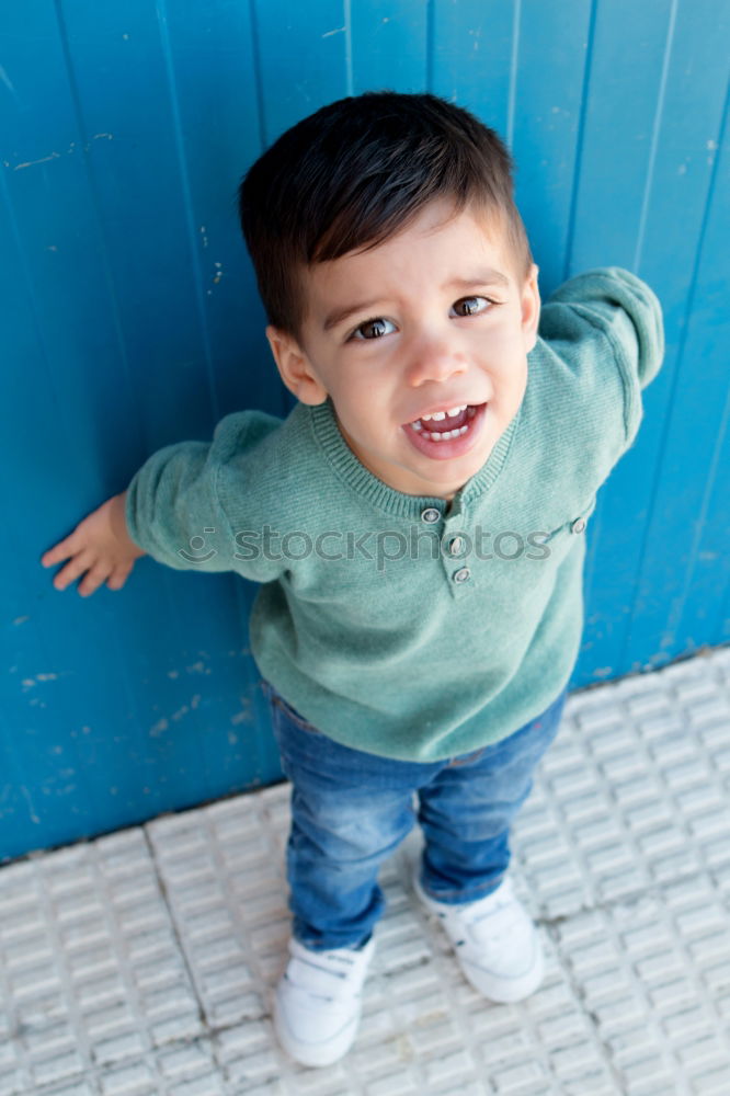 Similar – Portrait of a cute little boy on a village of an island greek