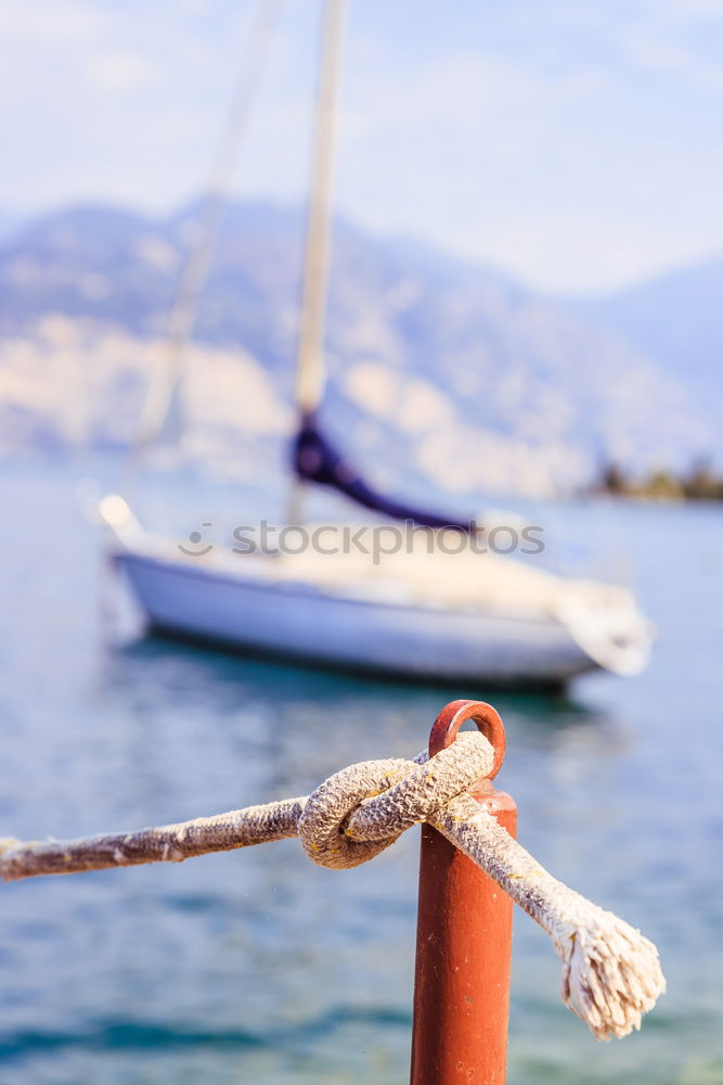 Similar – Image, Stock Photo Little boy on a dock sitting on his back looking to the ocean